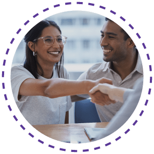 Portrait of a young couple handshake with a consultant